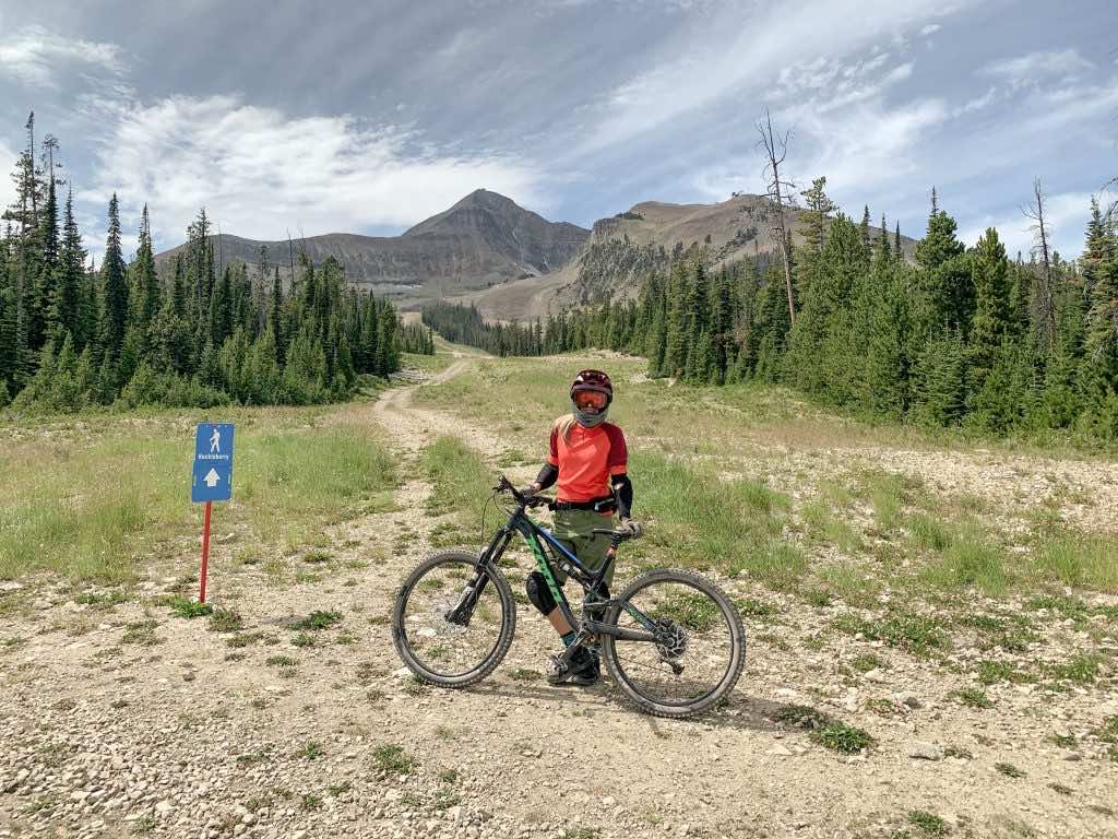 Mountain biker with Lone Peak in the background